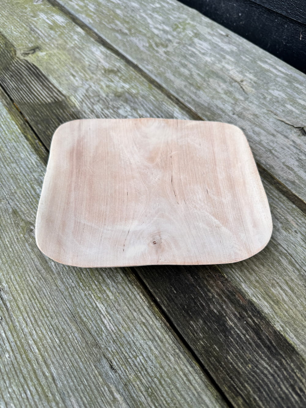 Hand-carved birch bowl with natural wood grain finish
