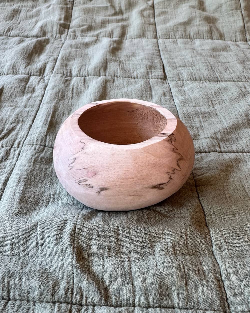 Hand-carved birch cup with elegant finish